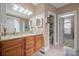 Bathroom featuring double sinks, granite counters, and a separate toilet room at 8143 Summit Ridge Dr # 41, Catawba, NC 28609