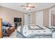 Bedroom featuring carpet, ceiling fan, and a decorative quilt on the bed at 8143 Summit Ridge Dr # 41, Catawba, NC 28609