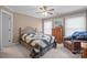 Cozy bedroom featuring carpet, ceiling fan, and a decorative quilt on the bed at 8143 Summit Ridge Dr # 41, Catawba, NC 28609