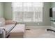 Bedroom area showcasing carpeted floor and large windows letting in natural light at 8143 Summit Ridge Dr # 41, Catawba, NC 28609