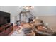 Bright bonus room featuring wood floors, sitting area, home gym, and built-in desk with bookshelves at 8143 Summit Ridge Dr # 41, Catawba, NC 28609