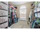 Large walk-in closet with custom shelving and storage solutions and window seat at 8143 Summit Ridge Dr # 41, Catawba, NC 28609