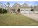 Charming home featuring a well-maintained lawn, inviting porch and a two-car garage at 8143 Summit Ridge Dr # 41, Catawba, NC 28609