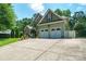 Beautifully landscaped home with a two-car garage and a well-maintained lawn at 8143 Summit Ridge Dr # 41, Catawba, NC 28609