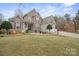 A beautifully landscaped front yard leads to this charming home with a three-car garage at 8143 Summit Ridge Dr # 41, Catawba, NC 28609