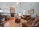 Comfortable living room features a stone fireplace, hardwood floors, and leather furniture creating a cozy atmosphere at 8143 Summit Ridge Dr # 41, Catawba, NC 28609