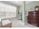 Cozy sitting area with plush ottoman and a view from the light filled window at 8143 Summit Ridge Dr # 41, Catawba, NC 28609