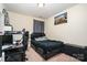 This cozy bedroom features black furnishings and decor with carpeted floors at 8460 Summerglen Cir, Charlotte, NC 28227