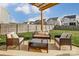 Relaxing backyard with a stylish pergola, comfortable seating, and a well-maintained lawn at 921 Von Buren Blvd, Rock Hill, SC 29730