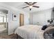 Bright bedroom with a ceiling fan and a view into the hallway and an adjacent room at 921 Von Buren Blvd, Rock Hill, SC 29730