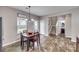 Cozy dining area with modern lighting and a view of the staircase at 921 Von Buren Blvd, Rock Hill, SC 29730