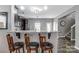 Modern kitchen with a breakfast bar and stainless steel appliances at 921 Von Buren Blvd, Rock Hill, SC 29730