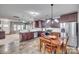 Open concept kitchen with stainless steel appliances and wood flooring at 921 Von Buren Blvd, Rock Hill, SC 29730