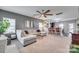 Spacious living room featuring a large sectional and open floor plan at 921 Von Buren Blvd, Rock Hill, SC 29730