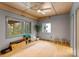 Bright bonus room with ceiling fan, wood floor, natural light and view to yard at 105 Hillside Dr, Davidson, NC 28036