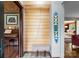 Inviting foyer showcasing unique architectural details, elegant decor, and seamless flow to the living spaces at 105 Hillside Dr, Davidson, NC 28036