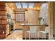Modern kitchen with skylight, custom cabinets, stainless steel appliances, and an island with bar seating at 105 Hillside Dr, Davidson, NC 28036