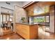 Open-concept kitchen featuring a central island, natural light, and seamless flow to the living spaces at 105 Hillside Dr, Davidson, NC 28036