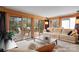 Inviting living room with sliding glass doors opening to outdoor dining at 105 Hillside Dr, Davidson, NC 28036