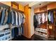 Spacious walk-in closet with wood shelving, ample hanging space, and modern storage solutions at 105 Hillside Dr, Davidson, NC 28036