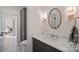Elegant bathroom featuring marble countertops, stylish fixtures, and modern lighting at 111 Kent Ct, Mooresville, NC 28117
