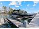 Covered boat on lift offers water access and lakeside living with great recreational opportunities at 111 Kent Ct, Mooresville, NC 28117