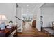 Spacious foyer boasts beautiful hardwood floors and staircase that leads to a bright living space at 111 Kent Ct, Mooresville, NC 28117