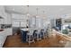 Spacious kitchen featuring a large island with bar seating, stainless steel appliances, and open access to living area at 111 Kent Ct, Mooresville, NC 28117