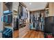 Well-organized walk-in closet featuring custom built-ins and hardwood floors at 111 Kent Ct, Mooresville, NC 28117