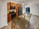 Modern kitchen with stainless steel appliances, granite countertops, and wood cabinets at 120 Cadbury Ln, Fort Mill, SC 29715