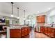 Spacious kitchen with granite countertops, stainless steel appliances, and a breakfast nook with ample natural light at 12011 Olden Ct, Charlotte, NC 28262