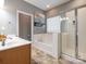 Clean bathroom featuring a shower stall, tub, and vanity sink at 13245 Chelsea Ridge Ln, Huntersville, NC 28078