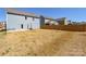 Expansive backyard featuring a mix of lawn, view of the fence, and the home's exterior at 133 Batten Ridge Dr, Statesville, NC 28677