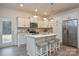 Modern kitchen with center island, stainless steel appliances, and bar stool seating at 133 Batten Ridge Dr, Statesville, NC 28677