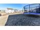 Spacious backyard featuring lawn and trampoline view in a residential neighborhood at 1444 Harleston St, Indian Trail, NC 28079