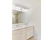 Bathroom featuring double sinks, white cabinets, and tile flooring at 1444 Harleston St, Indian Trail, NC 28079