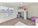 Bright bedroom with a loft bed, built-in desk, and plenty of space for play and storage at 1444 Harleston St, Indian Trail, NC 28079