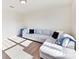 Inviting living room area featuring plush sectional sofa with bright natural light at 1444 Harleston St, Indian Trail, NC 28079