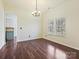 Inviting dining area with hardwood floors and ample natural light, creating a warm atmosphere at 14621 Sapphire Ln, Pineville, NC 28134