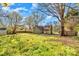 Large backyard with grass and trees, ideal for outdoor activities at 1759 Smith Ave, Gastonia, NC 28052