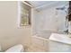 Cozy bathroom features an enclosed tub and shower combination at 1759 Smith Ave, Gastonia, NC 28052