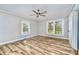 Inviting bedroom with lots of natural light and stylish wood-look floors at 1759 Smith Ave, Gastonia, NC 28052