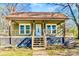 Charming home with a covered front porch, decorative railings, and a welcoming entrance at 1759 Smith Ave, Gastonia, NC 28052