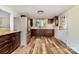 Updated kitchen with stainless steel appliances, dark cabinetry, granite countertops, and wood-look flooring at 1759 Smith Ave, Gastonia, NC 28052