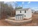 The home boasts a spacious backyard, featuring an additional sunroom and privacy fence at 2032 Country Pl, Hickory, NC 28601