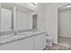 Spacious bathroom featuring a double vanity with granite countertops at 2032 Country Pl, Hickory, NC 28601