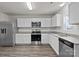 New kitchen with white cabinets, stainless steel appliances, granite countertops, and subway tile backsplash at 2032 Country Pl, Hickory, NC 28601