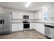 New kitchen with white cabinets, stainless steel appliances, granite countertops, and subway tile backsplash at 2032 Country Pl, Hickory, NC 28601