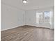 Bright and airy living room with wood-look flooring, neutral walls, and natural light at 2032 Country Pl, Hickory, NC 28601