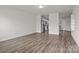 Bright and airy living room with wood-look flooring, neutral walls, and an open layout concept at 2032 Country Pl, Hickory, NC 28601